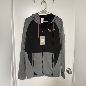 New Nike zip up 
Receive as a gift but not the right size. 
Never wore